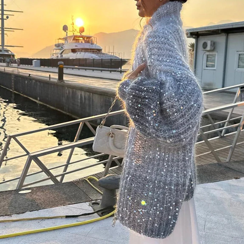 Sweater strikket med ensfarvede pailletter